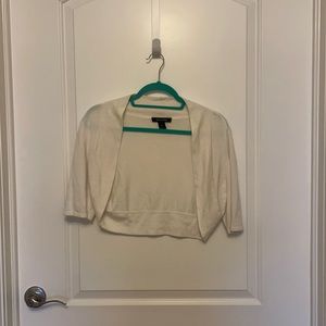 Cream colored “shrug.” Good for going over a dress.